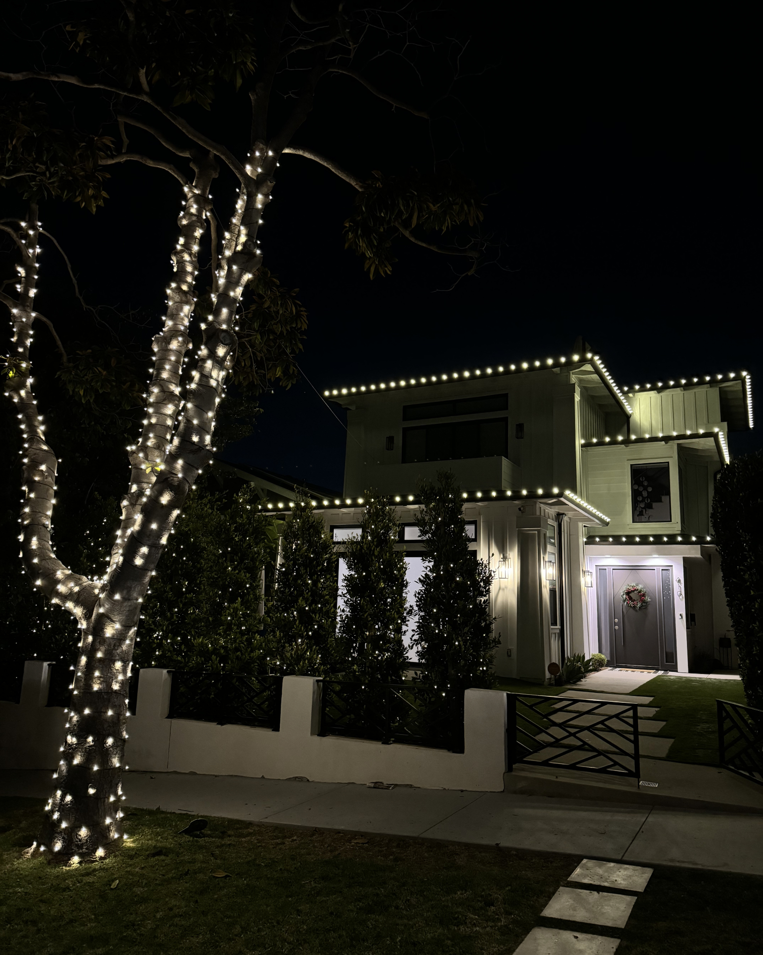 Professionally installed Christmas lights on a home exterior